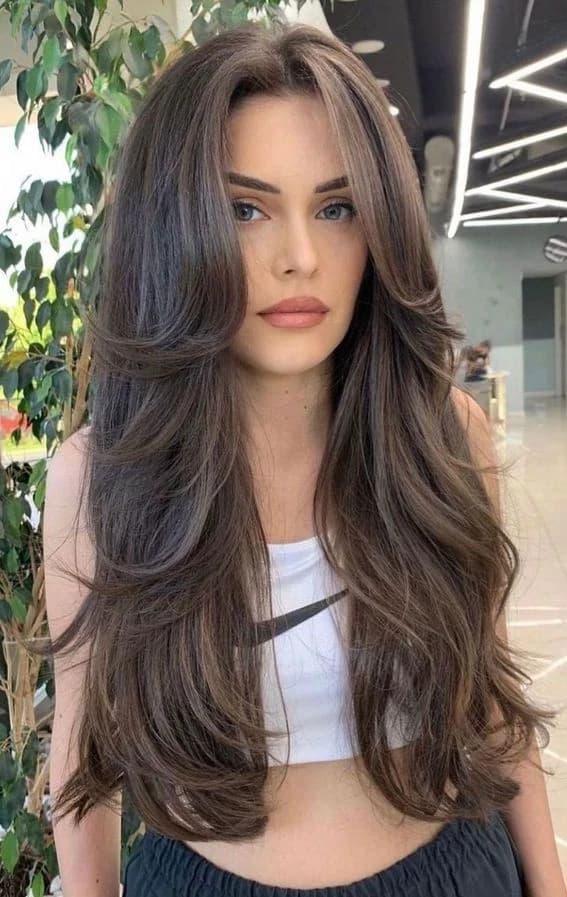 Voluminous long layered blow-dry styled at Elegant Landmark