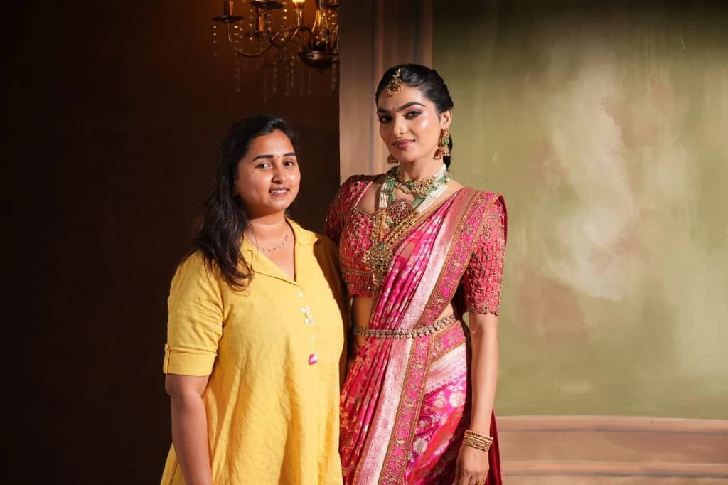 Bridal makeup and styling in a vibrant pink lehenga