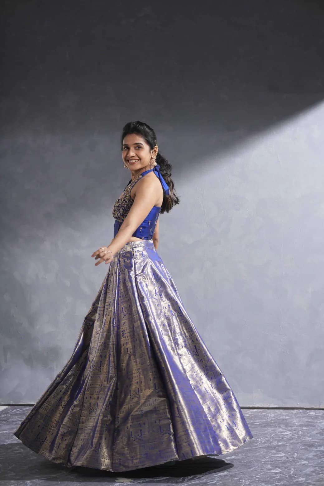 Elegant bridal lehenga styling with a graceful twirl